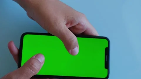 Phone with Green Screen and Chroma Key Closeup. Vertical Stock Footage 223628420