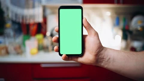 Phone with green screen in hand 스톡 동영상 180549453