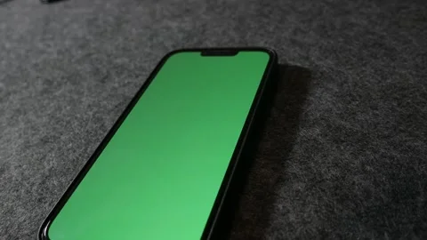 Phone with greenscreen. IPhone with greenscreen. Mobile phone with greenscreen.	 Stock Footage 255142144
