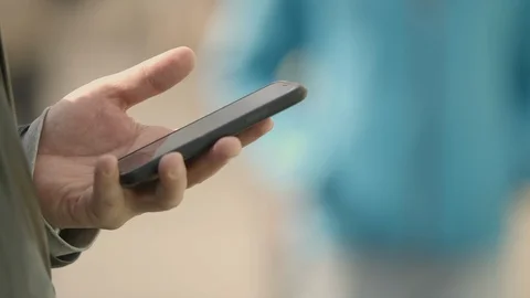 Phone in hand Stock Footage 104833584