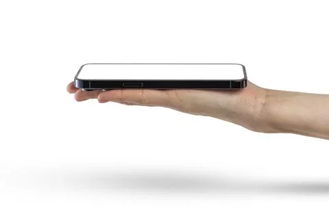 Phone in hand isolate on white background. A modern smartphone lies on the palm Stock Photos
