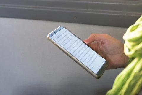 Phone in hand Stock Photos