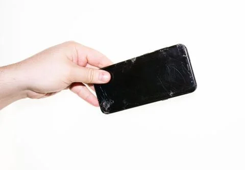 Phone in hand on a white background Stock Photos