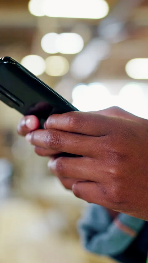 Phone, hands and construction worker on site with texting, email or feedback on Video stock 340450210