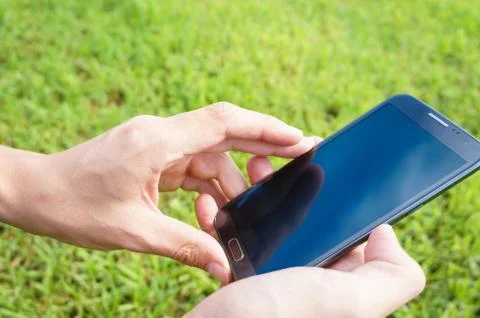 Phone in the hands of men Stock Photos