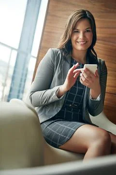 This phone has the best functionality for my business needs. Portrait of a young Stock Photos