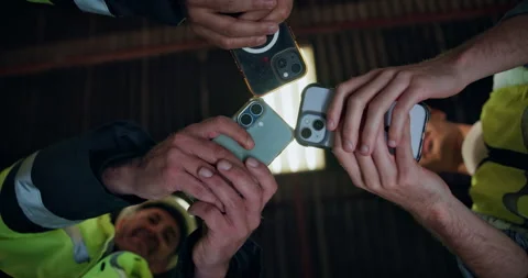 Phone, internet and hands of construction team together at site for engineering Stock Footage 338396648