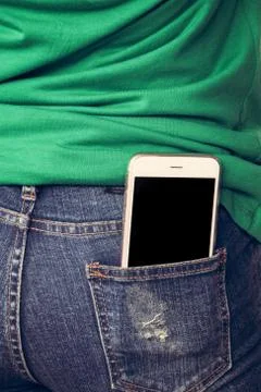 Phone in jeans bag Stock Photos