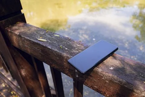 Phone lying outside Foto stock