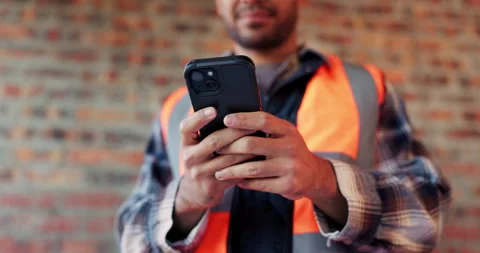 Phone, man and hands typing at construction site with engineering app, internet Stock Footage 336218584