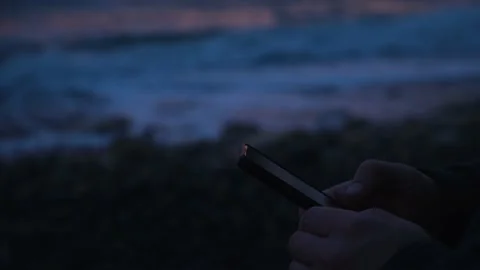 Phone man hand evening Stock Footage 239268158