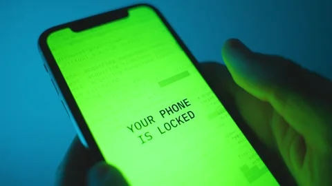Phone message pop on device screen alerting it is lock and request money ransom Stockbeeldmateriaal 323842609