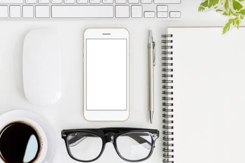 Phone mobile blank screen on work table top view, mock-up new smartphone go.. Stock Photos