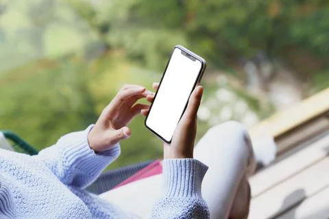 Phone mobile white screen display in hand, blank screen easy to Stock Photos