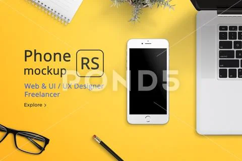 Phone mockup on desk surrounded with laptop, pad glasess and pen PSD-Vorlage
