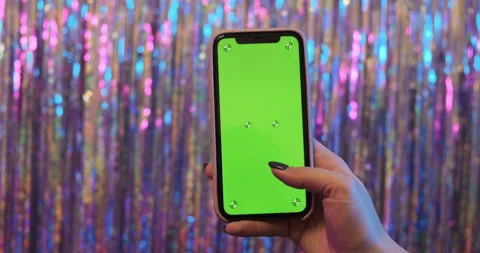 Phone mockup green screen chroma key on colorful shiny party birthday background 動画素材 150208652
