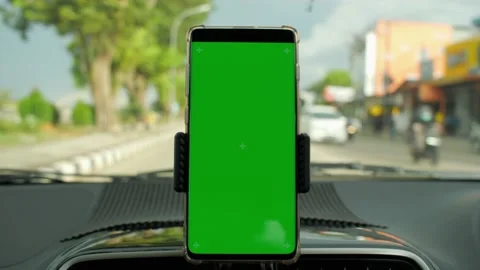 Phone as navigation device, blank green screen smartphone mock up template on Stock Footage 156382593