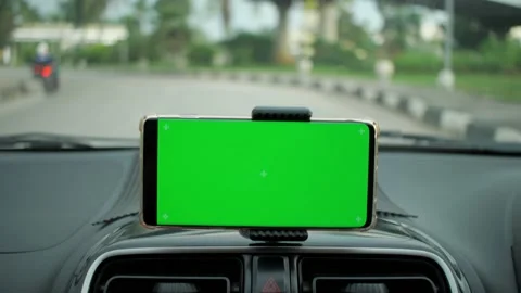 Phone as navigation device, blank green screen smartphone mock up template on Stock Footage 156382897