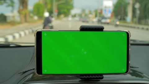 Phone as navigation device, blank green screen smartphone mock up template on Stock Footage 156383018