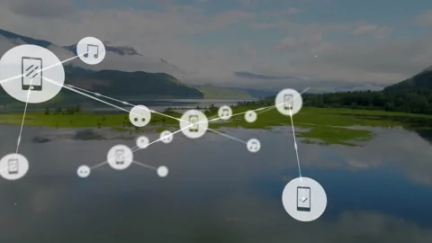 Phone node appearing over lake starting nodes linking and expanding showing Stock Footage 329786478