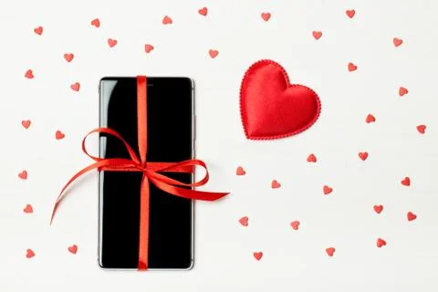 Phone packaged as a gift Stock Photos