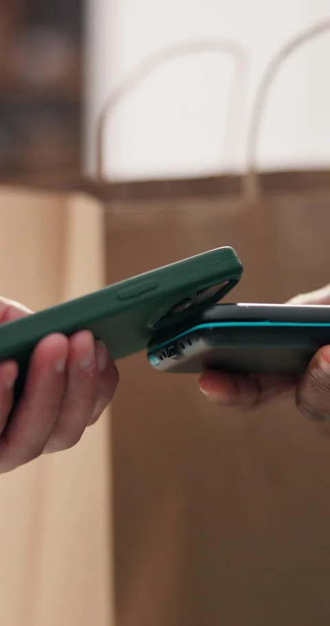 Phone, payment and hands with card machine for store purchase, fintech sale and Stock Footage 334454175