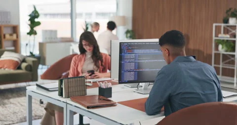 Phone, programming and typing with business woman in coworking office for Stock Footage 329420804