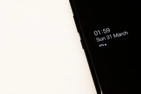 Phone screen with a displayed date of time change in 2019 Stock Photos
