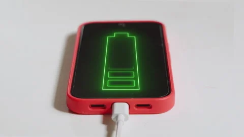 Phone Screen Displaying Green Animated Battery Charging Progress. Stock Footage 337520755