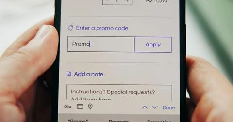 Phone screen, promo code and hands of person for retail, sale or store discount Foto stock