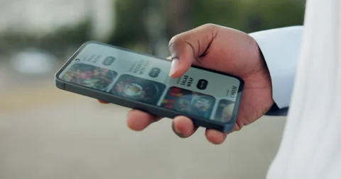 Phone screen, scroll and menu with hands in city for food delivery, ecommerce 動画素材 334052049