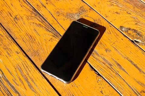 Phone on the Table closeup Stock Photos