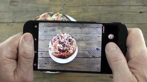 The phone takes pictures of Easter cake in 4K Stock Footage 147650862