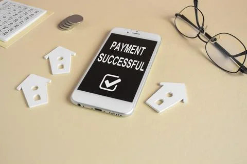 Phone with text payment successful on screen display Stock Photos