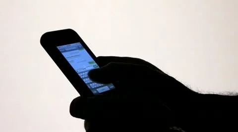 PHONE TEXTING SILHOUETTE ON WHITE BACKGROUND Stock Footage 10727625