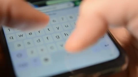 Phone typing closeup. man's hand type on iphone mobile device close-up. Video stock 302344997