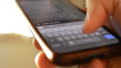 Phone typing telecommunication. man typing on the iphone. Vidéo 226958228
