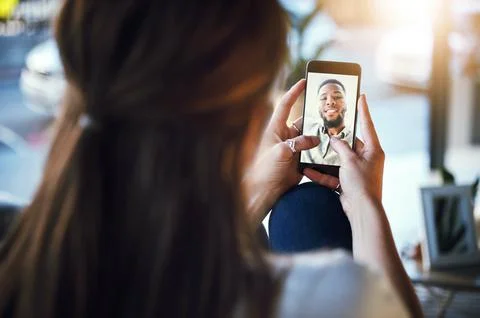 Phone, video call and woman speaking to man with zoom screen communication app Stock Photos