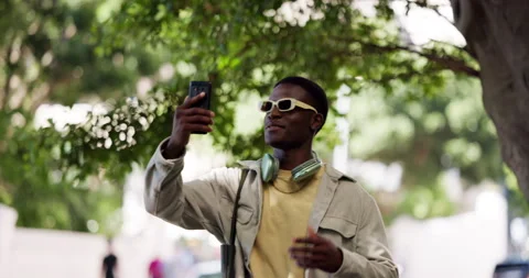 Phone, vlog and student with black man in city for video call, social media Stock Footage 323345097
