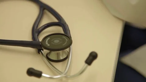 Phonendoscope on a table Stock Footage 82350944