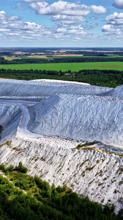 Phosphogypsum stack rises beside farmland near Kėdainiai, Lithuania Stock Footage 345500381