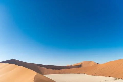 Photo of the blue sky with a duna in desert, Namibia. The concept of exotic Stock Photos