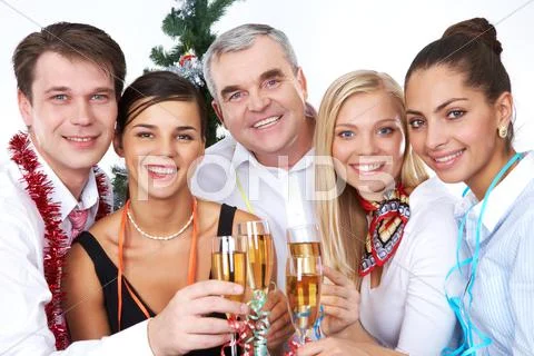 Photo of businesspeople with flutes of sparkling champagne Stock Photos