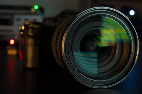 Photo Camera or Video lens close-up on black background DSLR objective Stock Photos