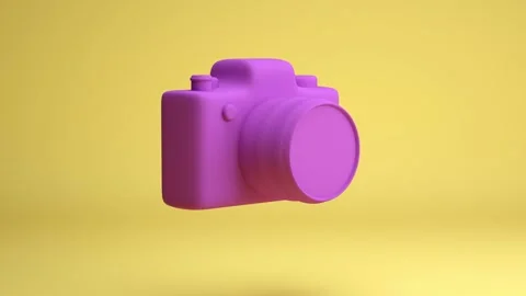 Photo camera on yellow background rotate 360 Stock Footage 193986618