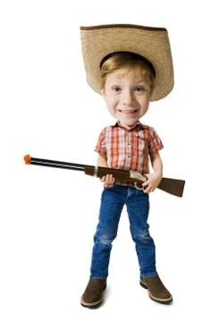 Photo caricature of boy with cowboy hat and toy rifle Stock Photos