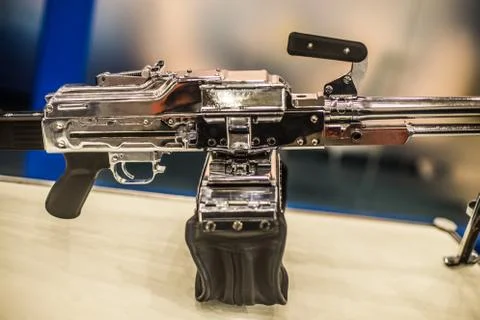 In the photo, a chromed machine gun Stock Photos