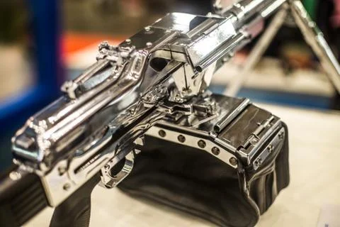 In the photo, a chromed machine gun Stock Photos