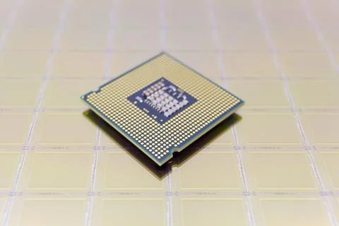 Photo of a Computer Chip CPU put on silicon wafer with microchip Foto stock
