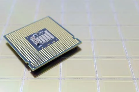 Photo of a Computer Chip CPU put on silicon wafer with microchip Foto stock